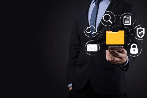 Document Management System DMS .Businessman hold folder and document icon.Sof Stockfoto's