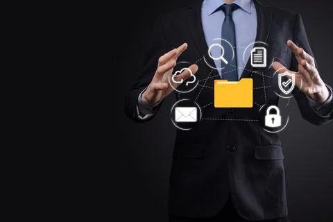 Document Management System DMS .Businessman hold folder and document icon.Sof 写真素材
