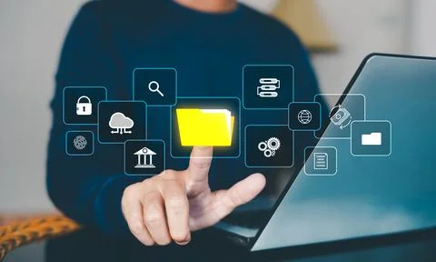 Document management System DMS, Businessman pointing folder icon to use techn Foto stock