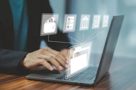 Document Management System (DMS)Entrepreneur using computer in office with .. Stock Photos
