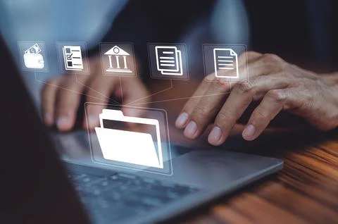 Document Management System (DMS)Entrepreneur using computer in office with .. Stock Photos