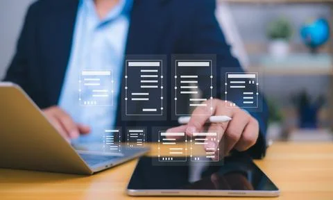 Document management visualized by a person interacting with holographic ico.. Stock Photos