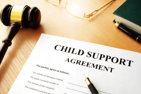 Document with the name child support agreement. Stock Photos