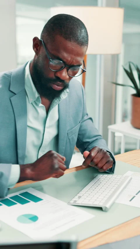 Document, reading or black man typing in office, identify new market trend or Stock Footage 330535935