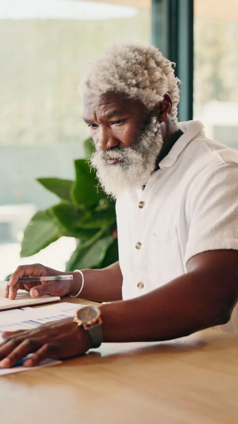 Document, remote work or man with notes in home for risk management, metrics or Stock Footage 346458492