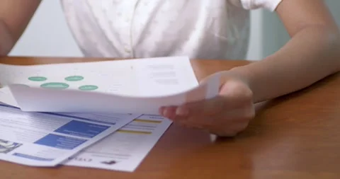 Document review process office professional work indoor close-up efficiency Stock Footage 313938294