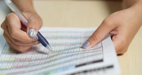 Document review process in office setting close-up of hands taking notes sheets Stock Footage 320083655