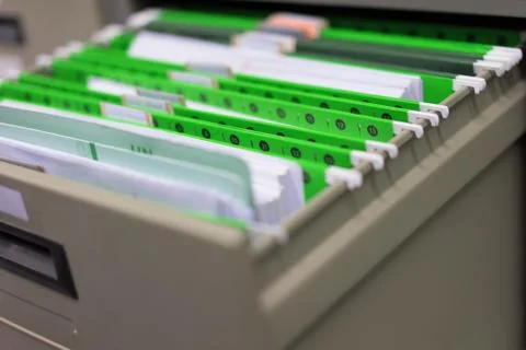 Document shelf and green file in the cabinet in the office in the storage roo Stock Photos