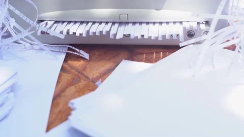Document shredder with paper shreds on floor.for recycling. Video stock 132383585