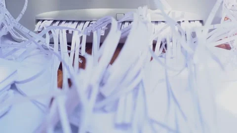 Document shredder with paper shreds on floor.for recycling. Video stock 132383605