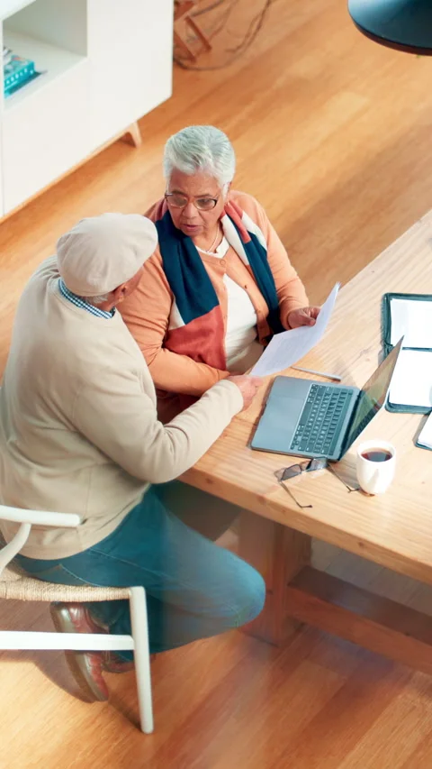 Document, table or senior couple reading with insurance policy, health finance Stock Footage 321390550