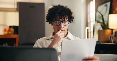 Document, thinking and man in home for remote work, accounting budget or ch.. Stock Photos