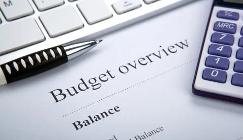 Document with title budget overview and keyboard Stock Photos