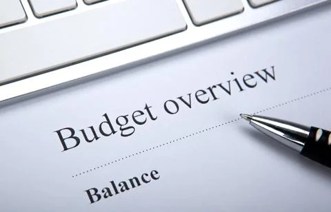 Document with title budget overview and keyboard Stock Photos