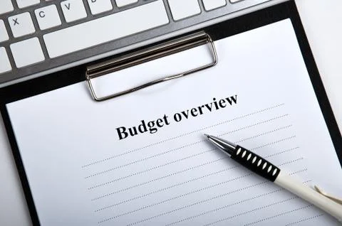 Document with title budget overview and keyboard Stock Photos