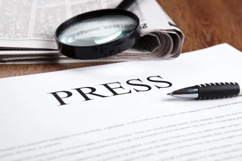 Document with the title of press Stock Photos