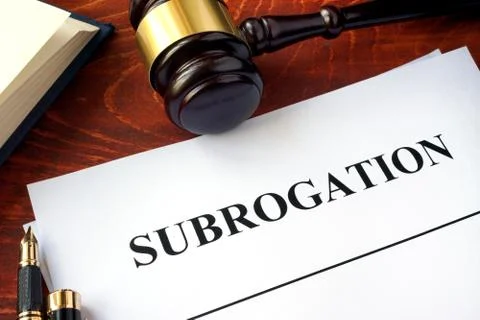 Document with title subrogation and gavel. Stock Photos