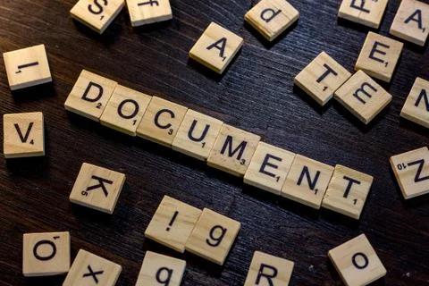 Document word made with scrabble letters. Stock Photos
