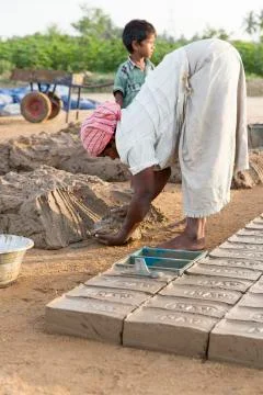Documentary  hand made bricks in India Stock Photos