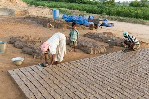 Documentary  hand made bricks in India Stock Photos