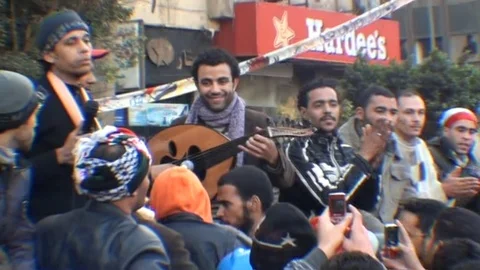 Documenting calls for change in Tahrir Square Stock Footage 114798364