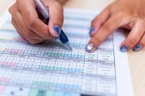 Documenting progress detailed analysis sheet for project management at offi.. Stock Photos