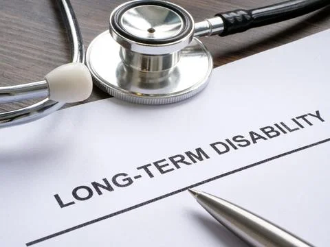 Documents about long term disability and stethoscope. Stock Photos
