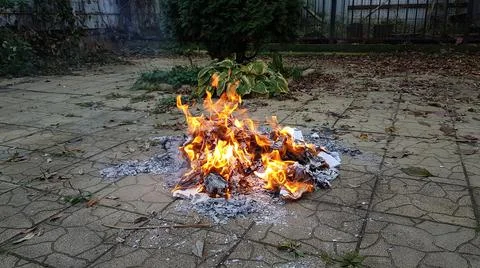 Documents and papers are on fire. hot news Stock Photos