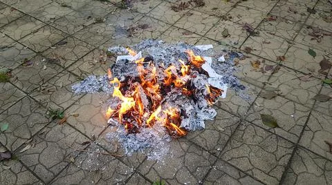 Documents and papers are on fire. hot news Stock Photos
