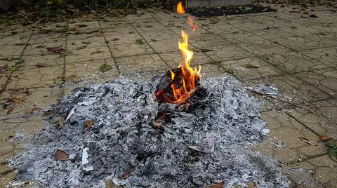 Documents and papers are on fire. hot news Stock Photos