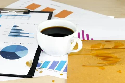 Documents on coffee stains Stock Photos