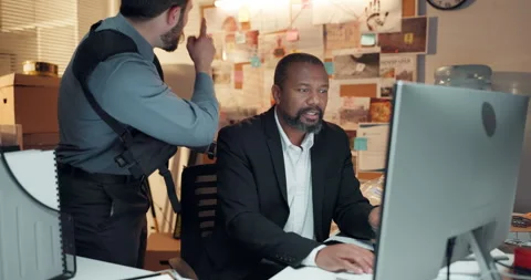 Documents, computer and private investigators in office with meeting for solving Stock Footage 314794494
