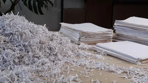 Documents Cut by a Paper Shredder. Shredding Services Stock Footage 242754913