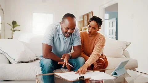 Documents, discussion and couple on sofa in home with budget planning, savi.. Stock Photos