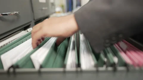 Documents at the filing cabinet Stock Footage 153571723