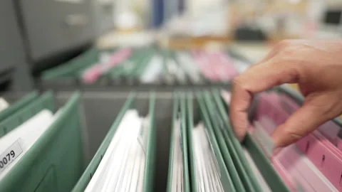 Documents at the filing cabinet Stock Footage 153571826