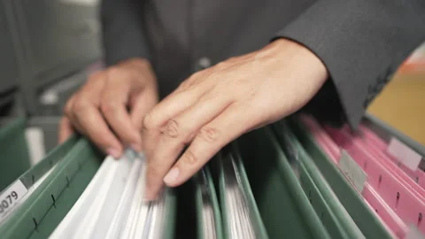 Documents at the filing cabinet Stock Footage 153571941