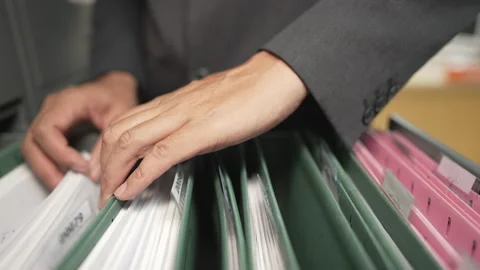 Documents at the filing cabinet Stock Footage 153572045
