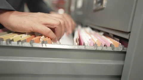 Documents at the filing cabinet Stock Footage 153572112