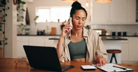 Documents, finance and phone call with woman in home for budget, investment or Stock Footage 329438400