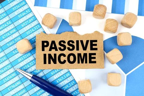 On documents with graphs and reports, there are cubes and cardboard with the  Stock Photos