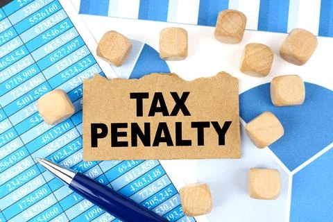 On documents with graphs and reports, there are cubes and cardboard with the  Stock Photos