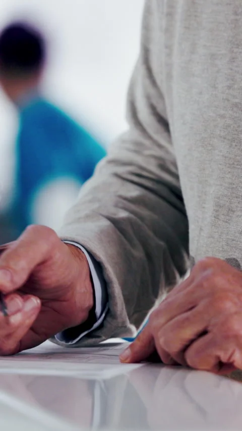 Documents, hands and writing with patient in hospital for appointment, check in Video stock 335351784