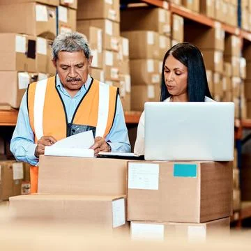 Documents, laptop and logistics with people in warehouse for delivery confi.. Stock Photos