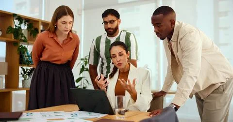 Documents, laptop and problem solving with business people in office for Stock Photos