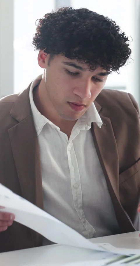 Documents, laptop or reading with man in office to review platform engagement on Stock Footage 332983970