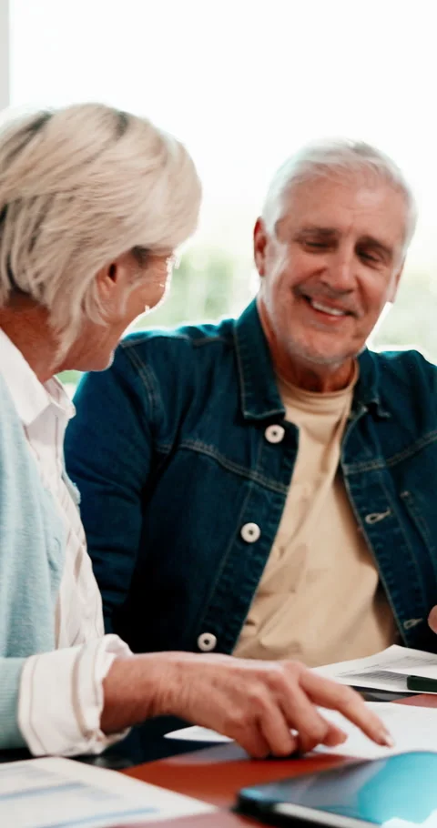 Documents, laugh and senior couple with high five in home with planning for Stock Footage 341489737