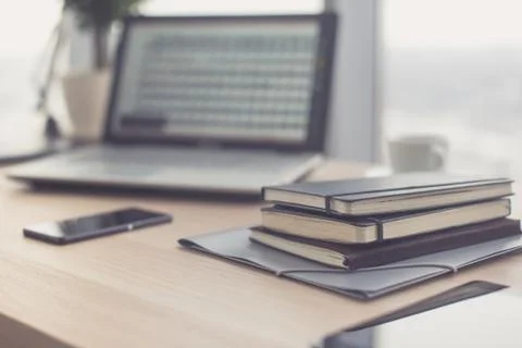 Documents on office table with pen and digital tablet as work space business Stock Photos