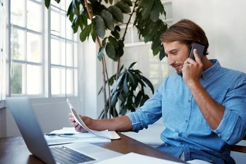 Documents, phone call and man in home office for contact, negotiation and remote Stock Photos
