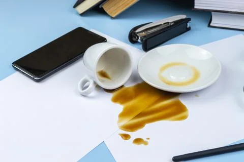 Documents poured with coffee Stock Photos
